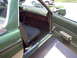 1970 Ford Ranchero - Interior view of a green 1970 Ford Ranchero, showing the dashboard and driver's seat.