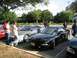 1994 Ford Probe - Two Ford Probes are parked side-by-side in a parking lot with people nearby.