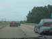 1994 Ford Probe - Two cars driving on a highway, one appears to be a 1994 Ford Probe.
