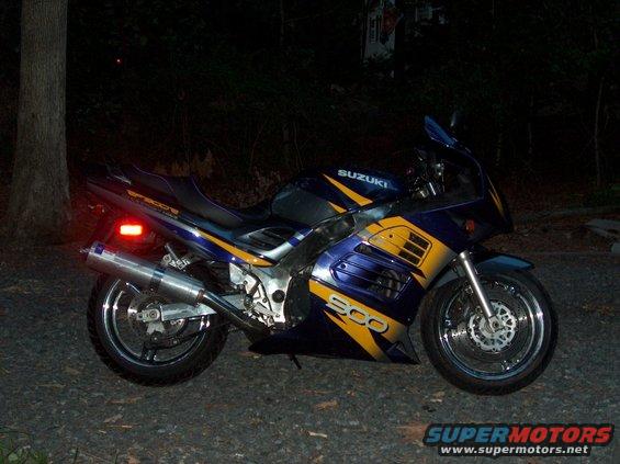 Blue and yellow Suzuki motorcycle with "1000" visible on the side fairing