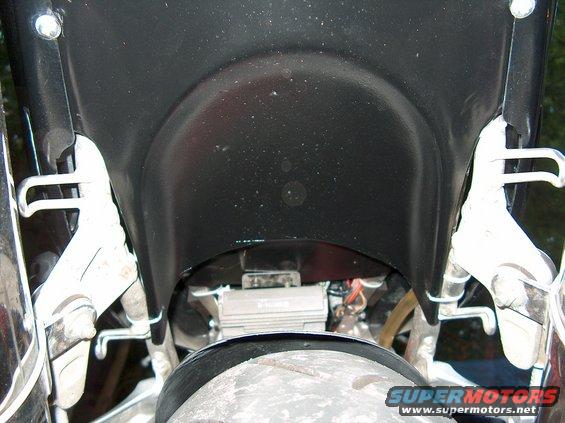 Motorcycle rear fender and tire with visible Supermotors.net logo