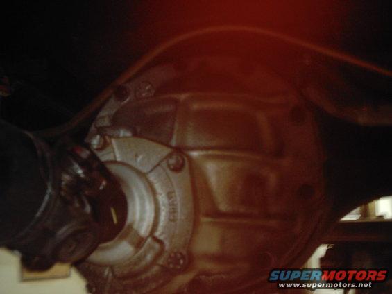 Rear differential housing with driveshaft attached