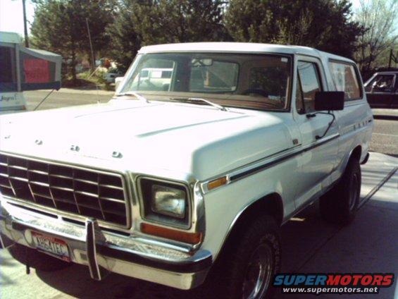 White Ford Bronco, front quarter view. Grille and body style match 1978 model
