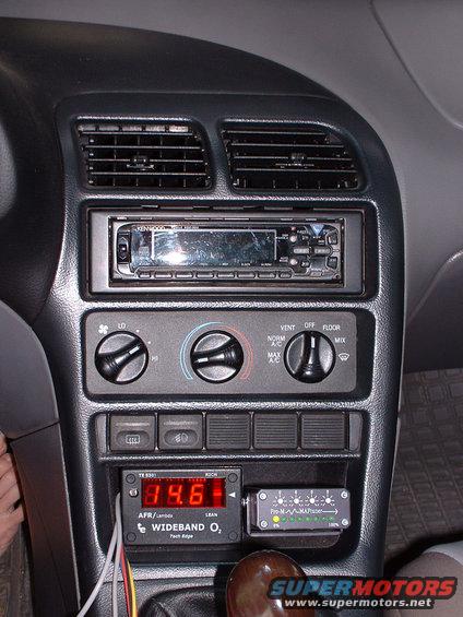 Interior dashboard with Kenwood stereo, air vents, climate controls, and aftermarket AFR/Lambda and Pro-M MAF-Master gauges