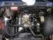 1979 Chevrolet C/K Pickup - View of the engine bay, a carburetor and an MSD ignition box, with various hoses and wiring visible.
