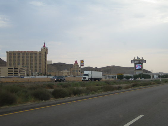 Highway view with Whiskey Pete's casino and a semi-truck on the road