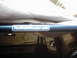 1978 Ford Bronco - Roll cage interior detail with a website sticker.