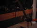 1978 Ford Bronco - Outdoor construction scene at night with lumber and a saw. Supermotors.net logo is present.