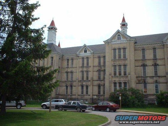 In front of Building 50, the main building of the Traverse City State Hospital.