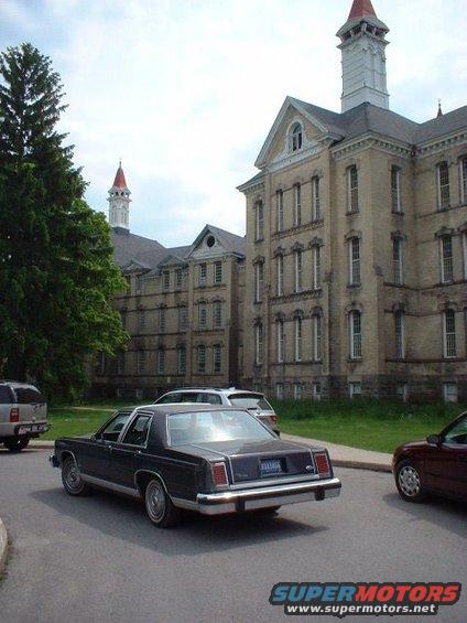 In front of Building 50, the main building of the Traverse City State Hospital.