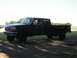 1996 Ford F-350 - This 1996 Ford F-350 crew cab pickup truck is seen from the side on a sunny day.