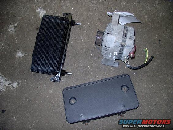 img_0223.jpg Happy, happy, Joy, Joy ! Got the 3G 130 amp alternator for $60 CDN. The stacked plate trans cooler (which is exactly like my B&M Supercooler) for $20 CDN and the license plate holder (also for my Lincoln Town Car) for a reasonable $5 CDN.
