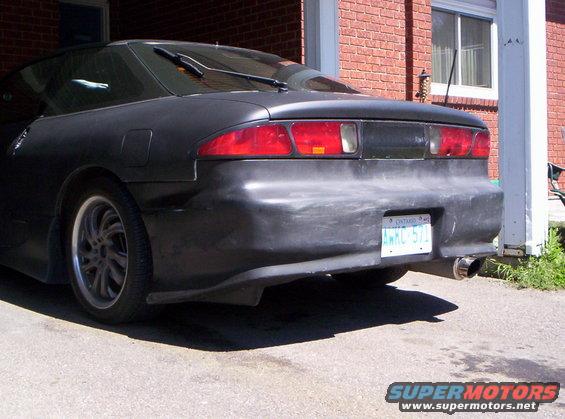 Black coupe rear view with Ontario license plate