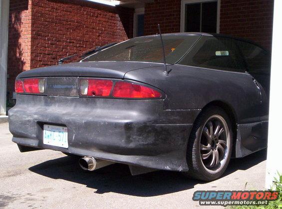 1993 Ford Probe rear view with aftermarket body kit and custom exhaust