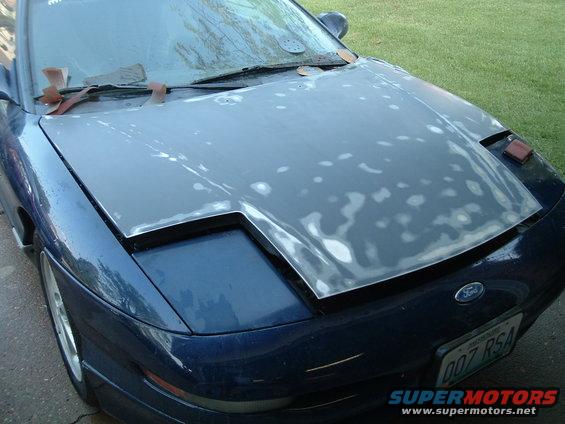 dscf1260.jpg Hood sanded to primer and bare metal