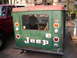 1973 Jeep CJ5 - Rear view of a green Jeep CJ-5 hardtop with a red roof and "JEEP" lettering.