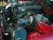 1990 Nissan 240SX - Close-up view of the engine bay in a 1990 Nissan 240SX, highlighting the turbocharger and intake system.