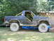 1986 Ford Bronco - This 1986 Ford Bronco features a yellow roll cage and is modified for off-road use.
