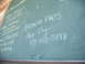 1988 Ford Bronco - A chalkboard displays contact information for 'Broncho Parts' and other listings.