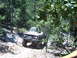 1988 Ford Bronco - This 1978 Ford Bronco navigates a rocky, wooded trail.