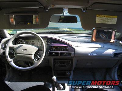 1995 Ford Taurus interior showing dashboard, steering wheel, and center console