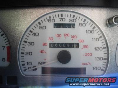 Close-up of a car's speedometer and odometer showing 60,841 miles