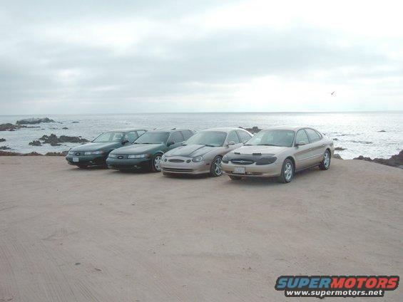 2005_0730image0040.jpg Abe's GEN 4, Sal's Sable sho, Matt's 93 mtx, my 95 mtx. Pacific Ocean in the background.