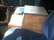 1986 Ford Bronco - Interior view of a car with a custom wooden console box installed between the seats.