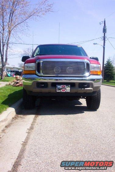 The front view of Hella driving lights behind the Still Billet Grill. A nice look that I get great comments on everywhere I go.