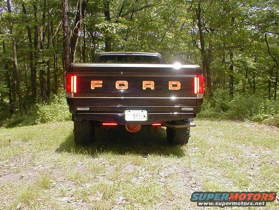 1991 Ford F-150 rear view, showing tailgate with woodgrain letters and license plate