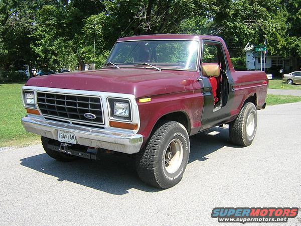 Maroon 1979 Ford Bronco 3/4 front view with grille detail