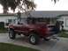 1996 Ford Bronco - Top Off. Showing a customized, fabricated roll cage that fits up under the factory hardtop. Which is custom fitted with…