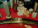 1997 Ford Probe - A car bumper and various parts are laid out on a red surface, suggesting a repair or restoration project is underway.
