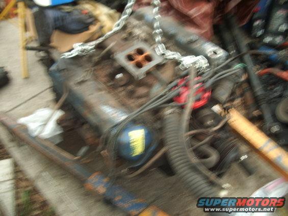 Engine with red distributor and blue oil filter