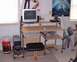 2006 Ford E350 - Here's my computer desk, complete with stand-up Yoda, KC Chiefs trash can, and more posters.