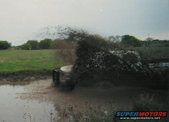 oxbow-1.jpg "Mudding" (not really, just driving through diry water)... only way to get through a water hole in a heavy-assed diesel with BFG All Terrains- with lots of momentum.