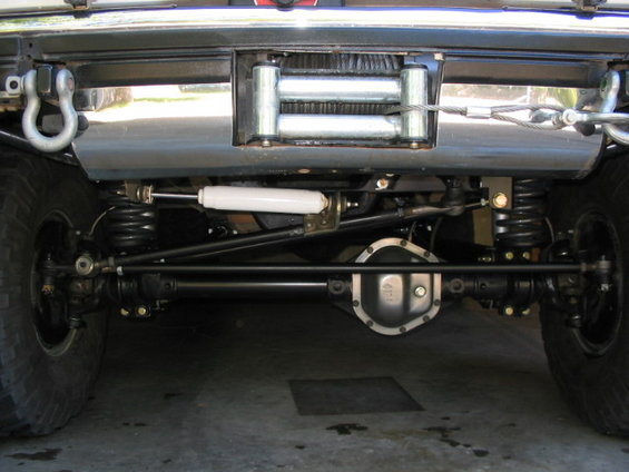 107_0787.jpg Track bar.  Originally tried using the stock 78-79 bar.  I redid that and now am running 1.125 DOM (.25 wall) tapped for 3/4" rod ends, secured with 3/4" GR8 bolts at both ends.  Angle with drag link is within 1*.