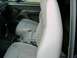 1992 Ford Bronco - Interior view of a vehicle's front seats and center console, showing the fabric pattern and console details.