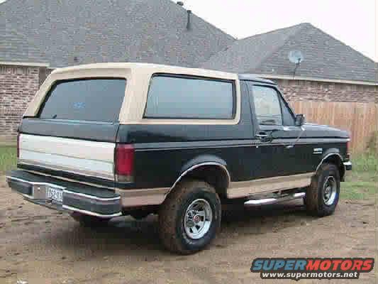 1988 Ford Bronco, black and tan, rear 3/4 view