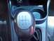 2002 Nissan SE-R - Close-up of a manual transmission gear shift knob inside a vehicle.