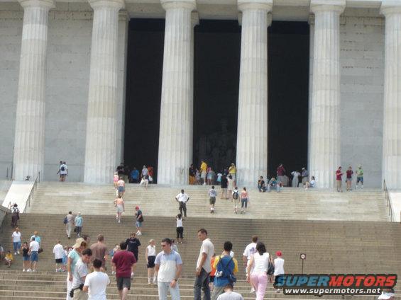 Lincoln Memorial steps with many people climbing and standing