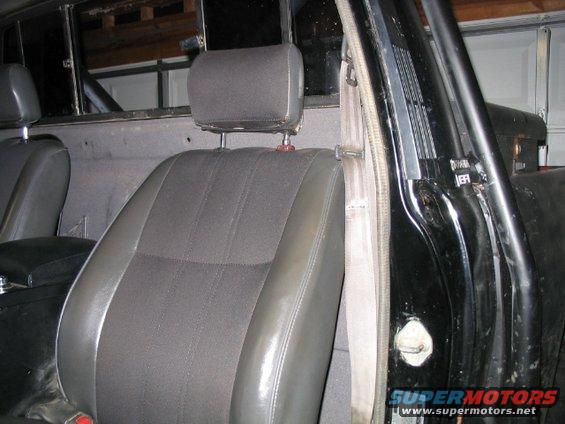 1986 Ford F-150 interior showing front seats and door frame