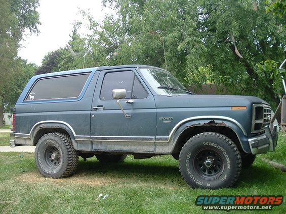 Blue 1982 Ford Bronco side view with off-road tires