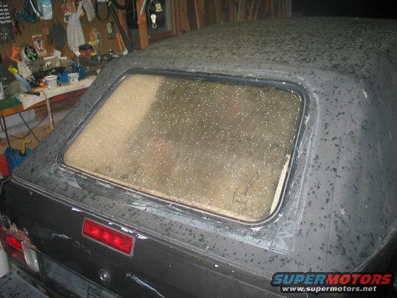 1986 Volkswagen Cabriolet rear with dirty soft top and rear window