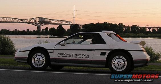 White 1984 Pontiac Fiero Official Pace Car with red and black stripe detail