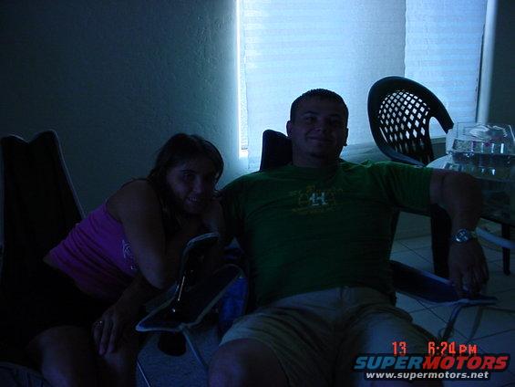 People sitting indoors, timestamp 13 6:24 PM SUPERMOTORS www.supermotors.net