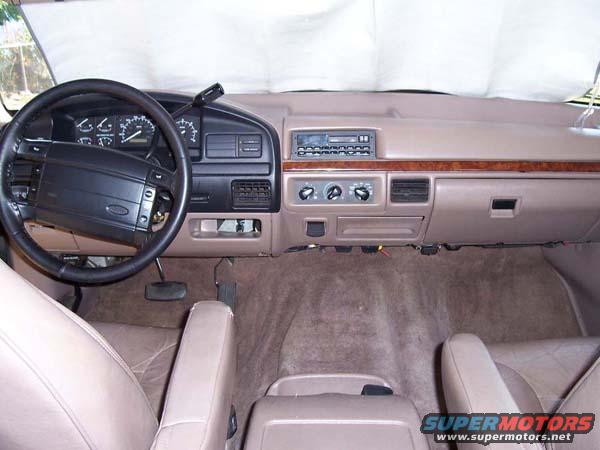 1996 Ford Bronco interior showing dashboard, steering wheel, and seats