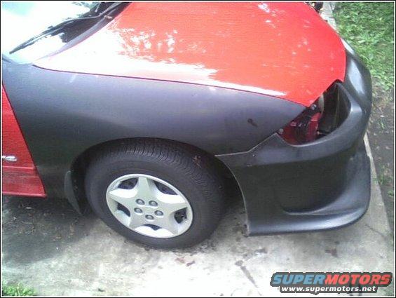 Red and black car fender and bumper with a five-star wheel