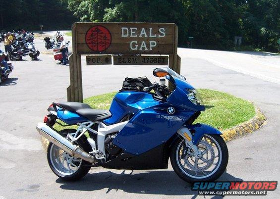 Blue 2005 BMW R1200CA ABS motorcycle parked at Deals Gap sign