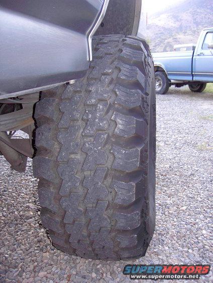 Close-up of a 1992 Ford F-150's large off-road tire